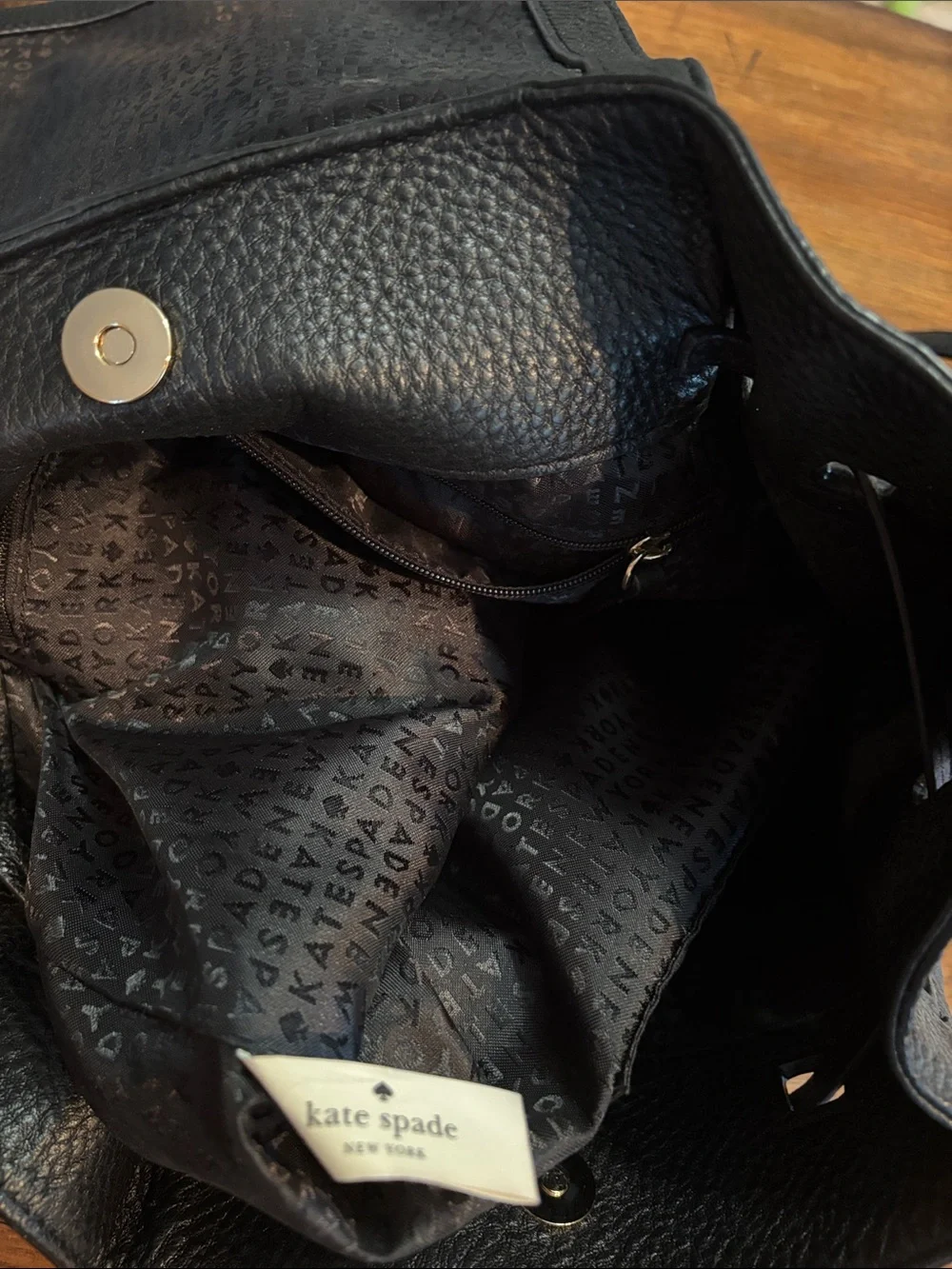 kate spade Black Pebbled Leather Drawstring Backpack Purse